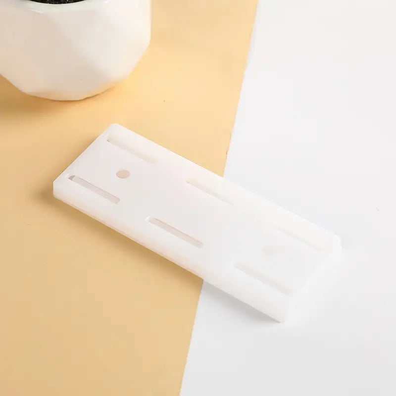 Self-Adhesive Wall-Mounted Multi Plug Holder – Slide-In Design for Easy Organization