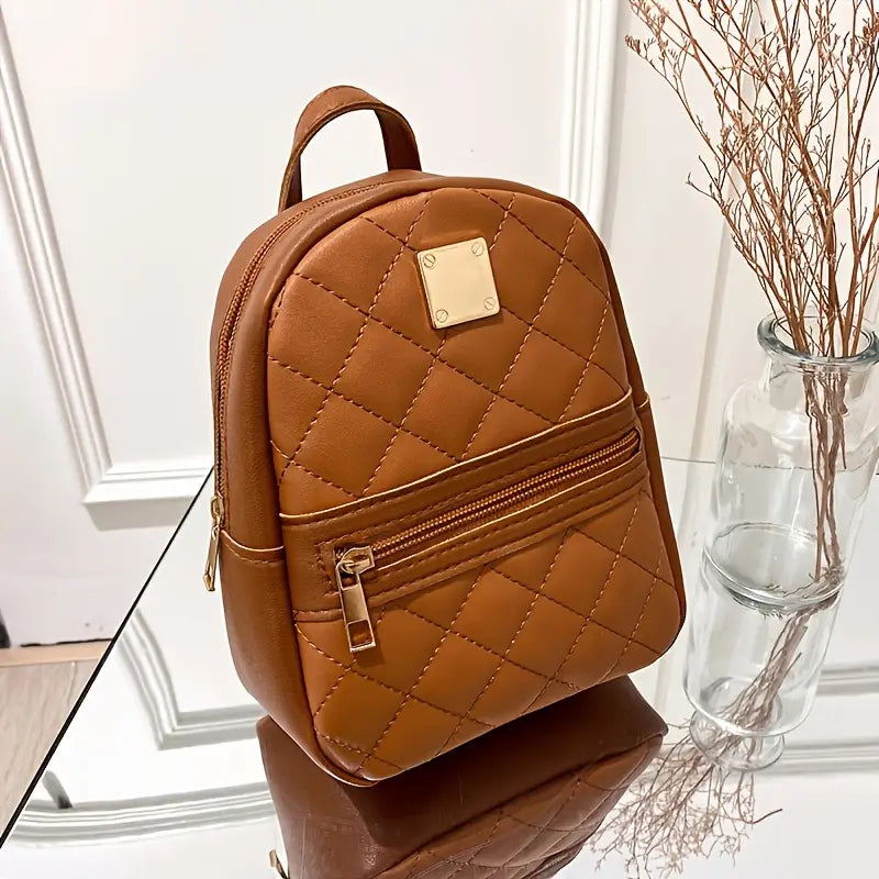 Chic Mini Backpack with Patterned Design & Gold Accent Details – Compact and Fashion-Forward
